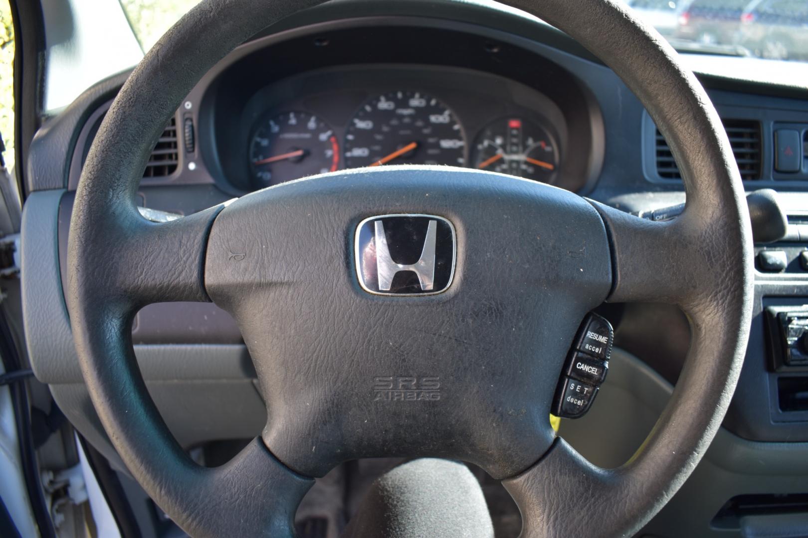2003 White /Gray Honda Odyssey (5FNRL18513B) , located at 5925 E. BELKNAP ST., HALTOM CITY, TX, 76117, (817) 834-4222, 32.803799, -97.259003 - Buying a 2003 Honda Odyssey can be a smart choice for several reasons: Reliability: Hondas are known for their reliability, and the Odyssey is no exception. The 2003 model year is often praised for its durability and long-lasting performance. Safety: The 2003 Honda Odyssey comes equipped with safe - Photo#9